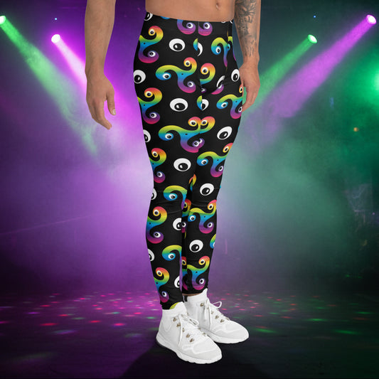 Man from the waist down wearing Trippy Triskelion leggings facing to the right in a nightclub environment with purple and green lights