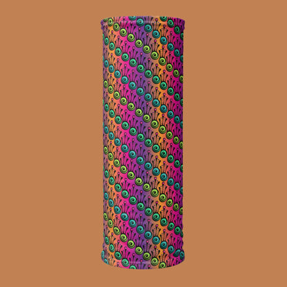 An image of a vibrant tribal frog neck laid flat vertically, against a burnt orange background. The fire tribal frog design is an abstract pattern with a blended purple, pink and orange background. The abstract detail is coloured in different shades of green.