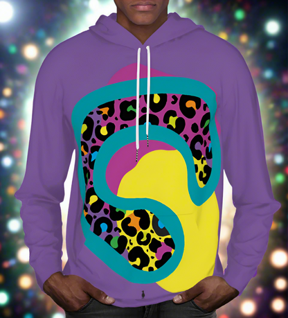 Man from the chin down to the waist, posing standing facing forwards wearing a 100% cotton vibrant purple leopard leopard splodge graphic hoodie. He is standing against a backdrop of coloured light orbs. The hoodie is purple with a retro rainbow coloured leopard print design covering the front. A large turquoise-green leopard print motif contains lots of smaller leopard print motifs with rainbow coloured centres. This lies on top of large pink and yellow splodge shapes.