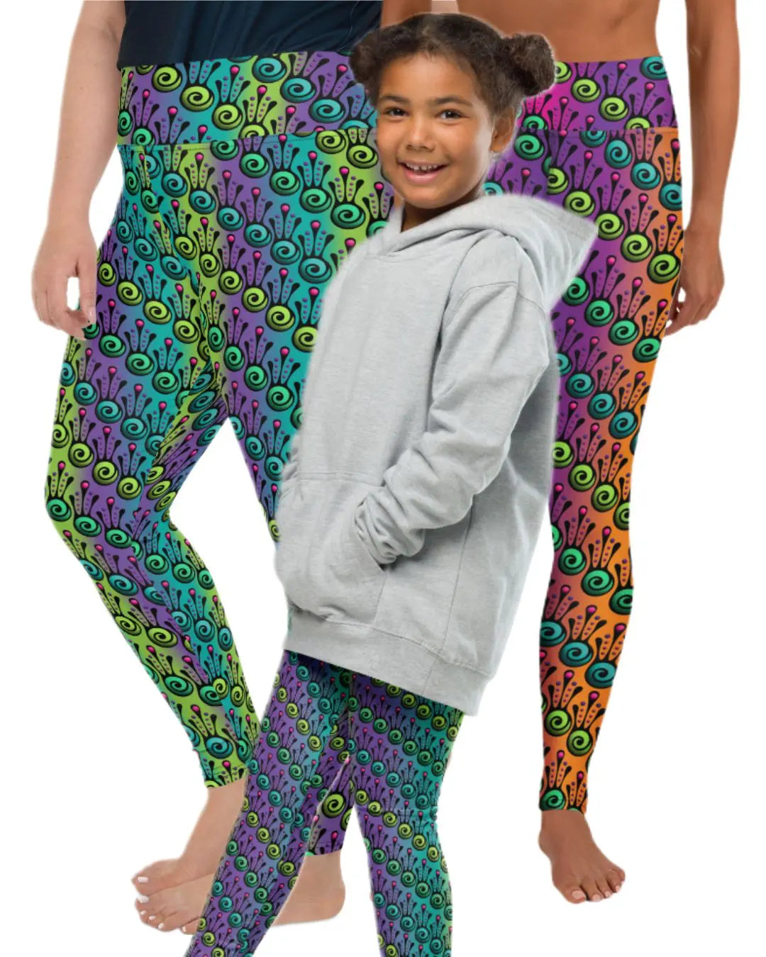 Two women and a child wearing coordinating Tribal Frog all over printed pattern festival leggings - designed in Wales | Sassy Seagull
