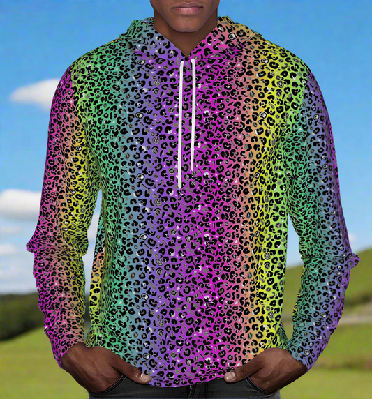 Man from the chin down to the waist, posing standing facing forwards wearing a 100% cotton vibrant rainbow leopard glamour all-over print animal print hoodie. He is standing outside on a hill side on a sunny day with blue sky. The hoodie has a blended rainbow colour background from pink through to purple. The blend is a vertical stripe. The leopard print pattern is medium size in black, grey and white and sits on top of the rainbow background. It is a bold fun design for everyday wear.








