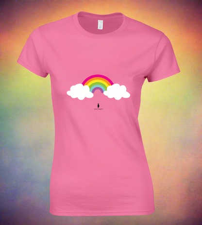 Salmon pink t-shirt with rainbow graphic on the front with two white fluffy clouds, one at each end of the rainbow. Below the graphic is our Sassy Seagull logo. The rainbow is 6 colours from pink, orange, yellow, lime green, turquoise and purple. The t-shirt is displayed against a hazy rainbow light effect background.