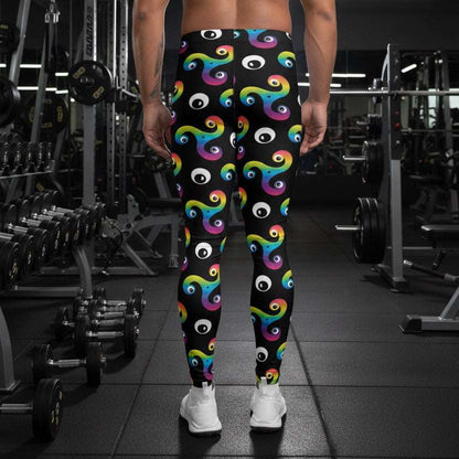 Man from the waist down wearing Trippy Triskelion leggings facing away in a nightclub environment with purple and green lights