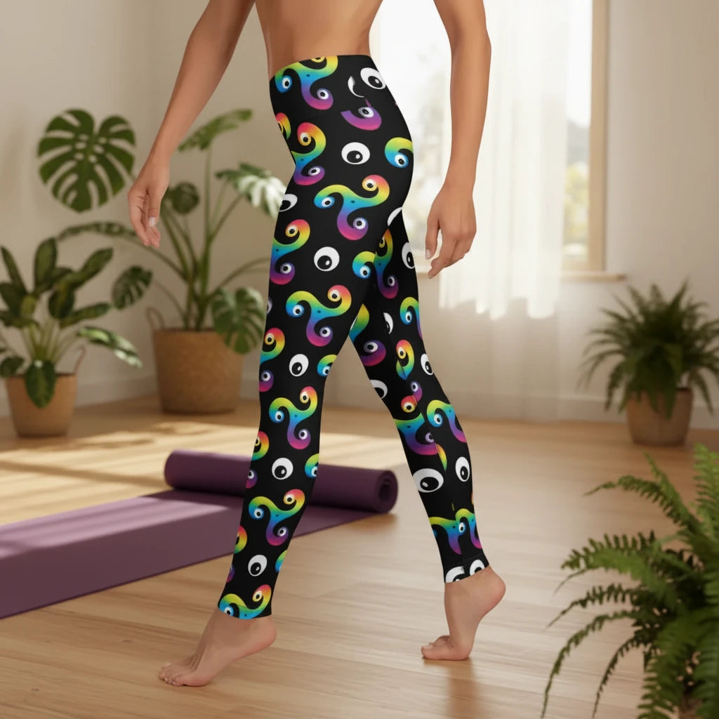 High waist black psychedelic celtic inspired Trippy Triskelion patterned festival & yoga leggings side view against a silver sequin background. The Trippy Triskelion print is a trippy rainbow geometric printed pattern. Designed in Wales, UK | Sassy Seagull. 