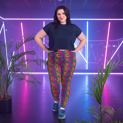 High waist Plus Size Fire Tribal Frog festival yoga leggings lifestyle. Woman is standing in an indoor setting.  The Tribal Frog design is a bold colourful abstract print on a blended pink, purple and orange background. Designed in Wales, UK | Sassy Seagull. 