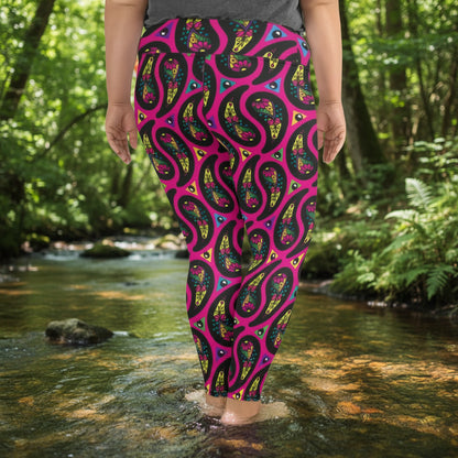 High waist Plus Size Pink Paisley Party festival yoga leggings back view. Woman is standing in front of a shimmery silver sequin backdrop.  The Paisley Party design is a bold colourful rainbow geometric print pattern. Designed in Wales, UK | Sassy Seagull. 