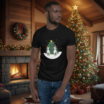 Person wearing a black 100% cotton Christmas t-shirt with two sassy seagulls in front of a decorated Christmas tree. The person is standing in a wooden chalet decorated for Christmas.