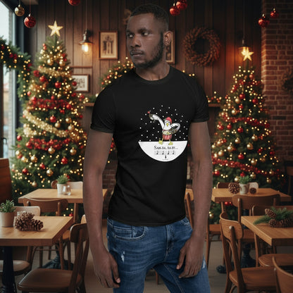 Man wearing a black 100% cotton samba drumming seagulll in the snow Christmas t-shirt with the text Samba Baby in a rustic cafe filled with red, green and gold Christmas decorations